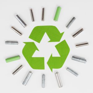 recycle-logo-surrounded-by-trash-batteries